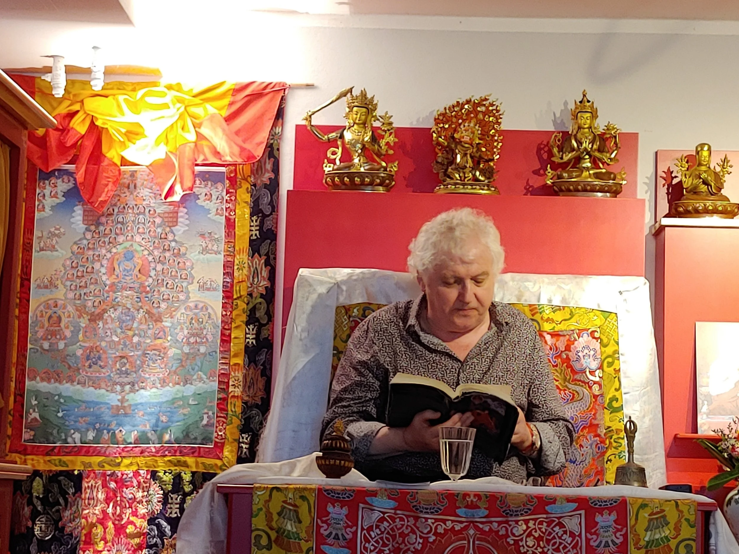 Buddha statue blessing, sharing Sapan’s wisdom and White Dzambala’s wealth