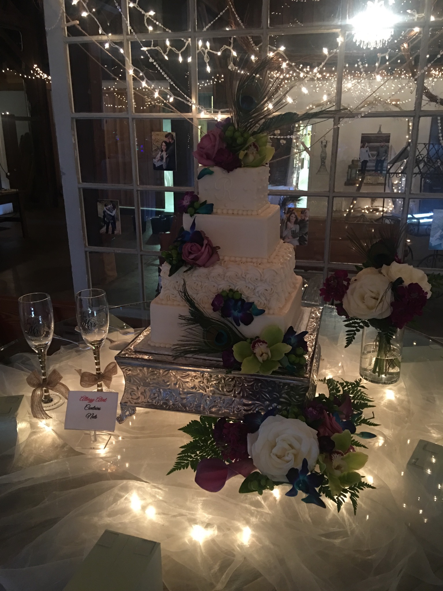 Beautiful wedding cake with window backdrop