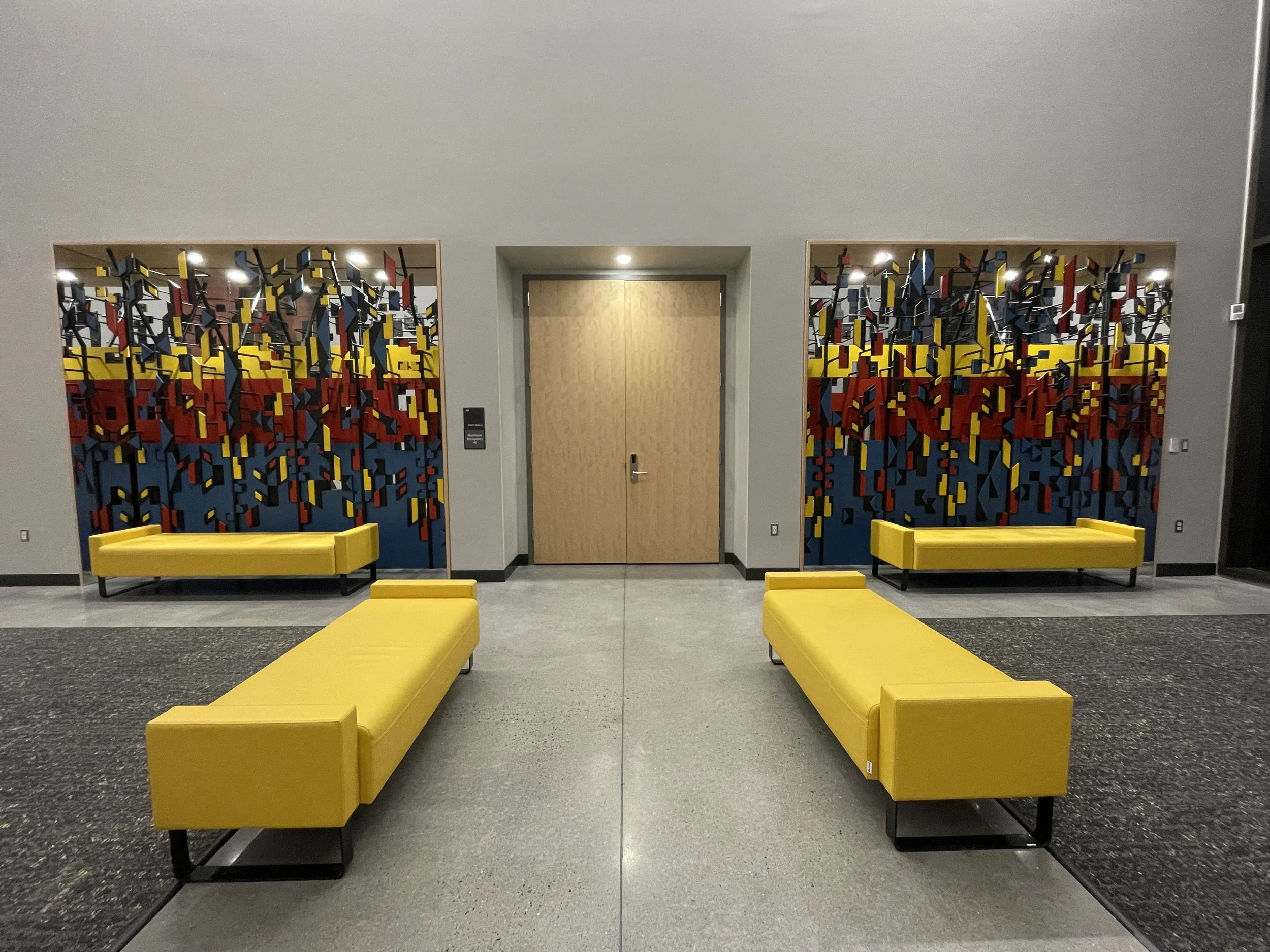 Niches on either side of studio entry