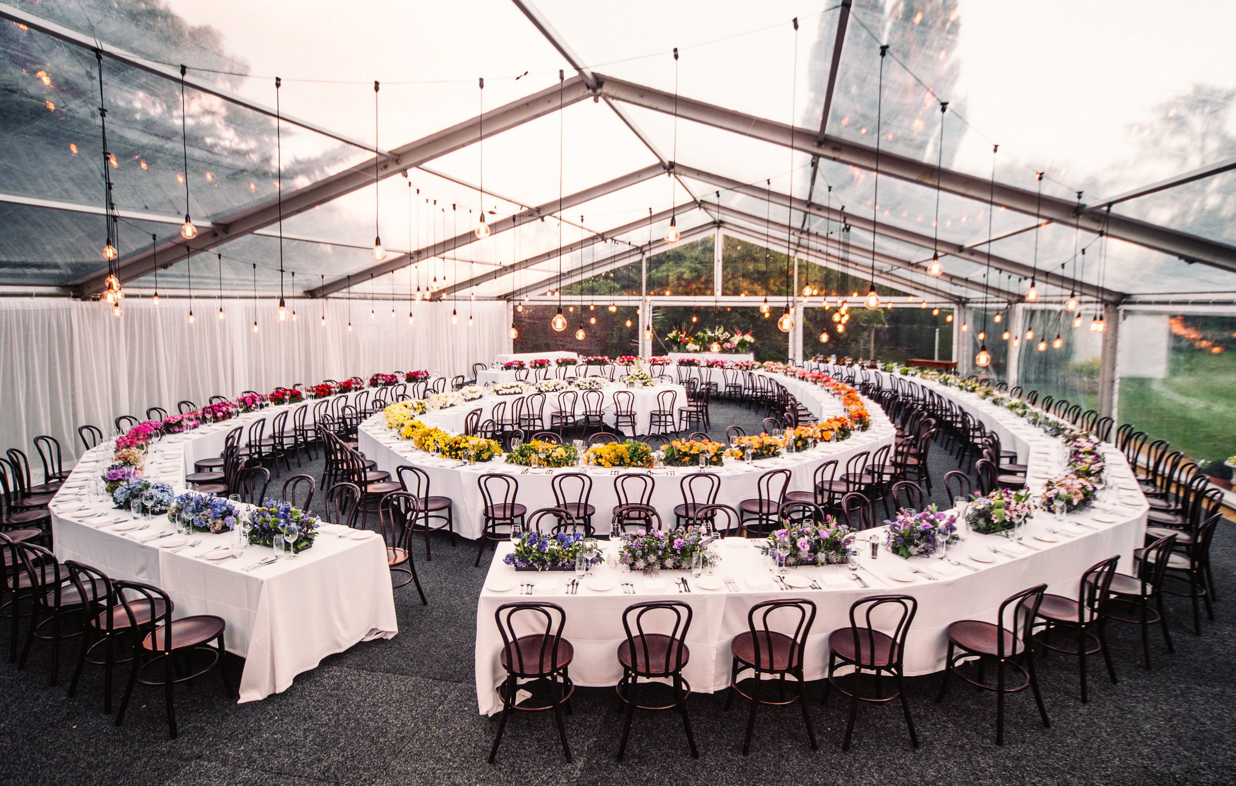 Spiral table in a clear marquee custom lighting