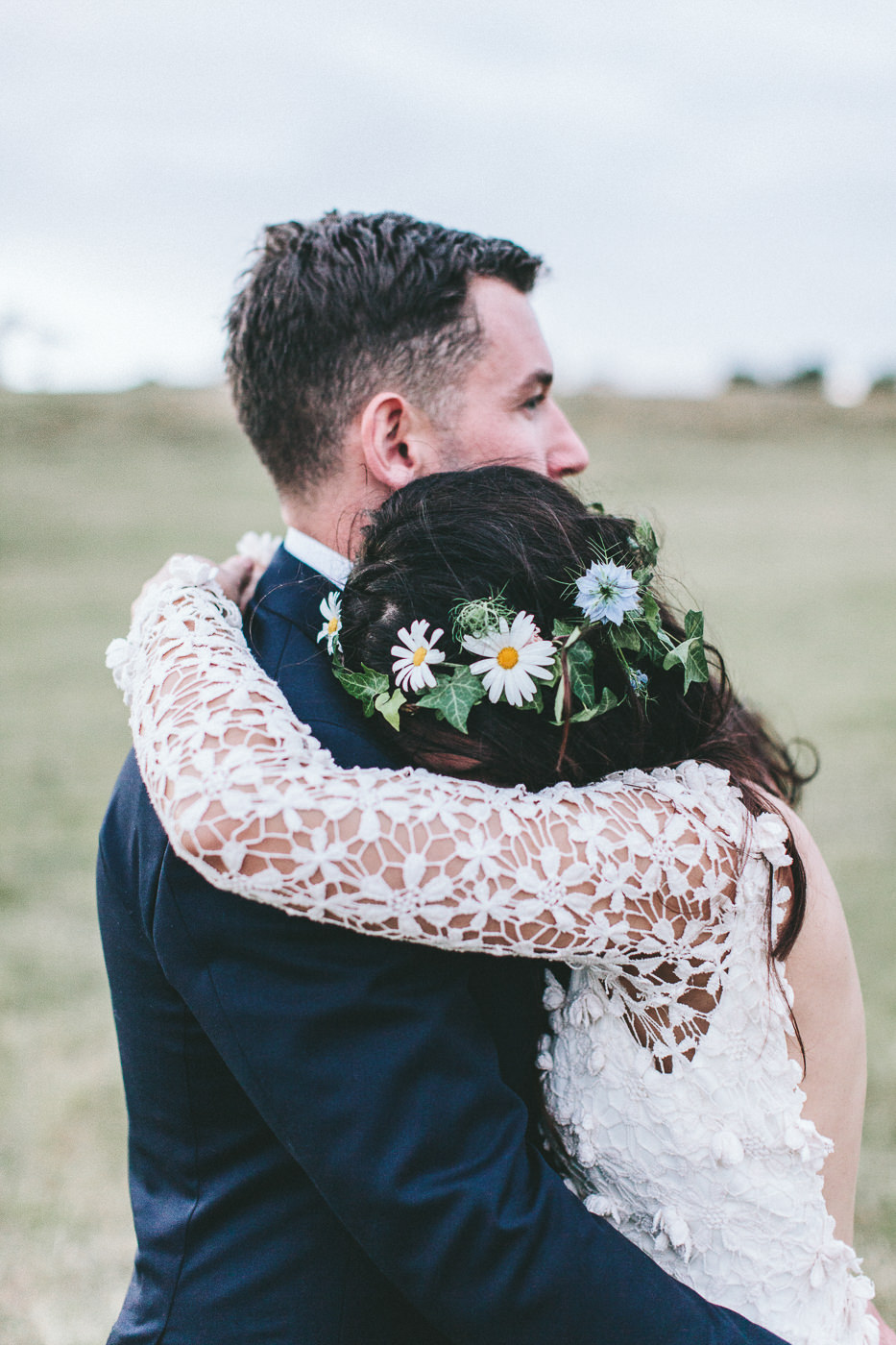  Bride and groom with floral crown 