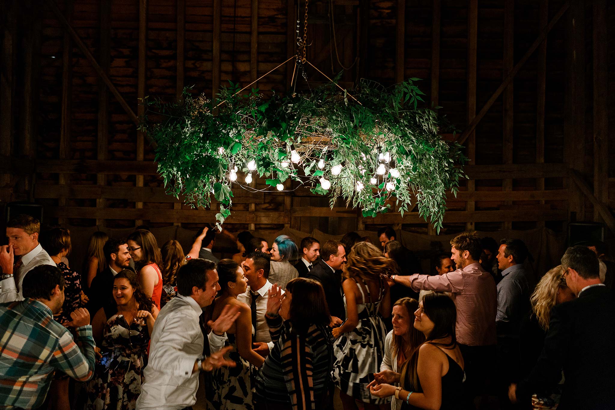  Dancing the night away under the custom made foliage chandelier 