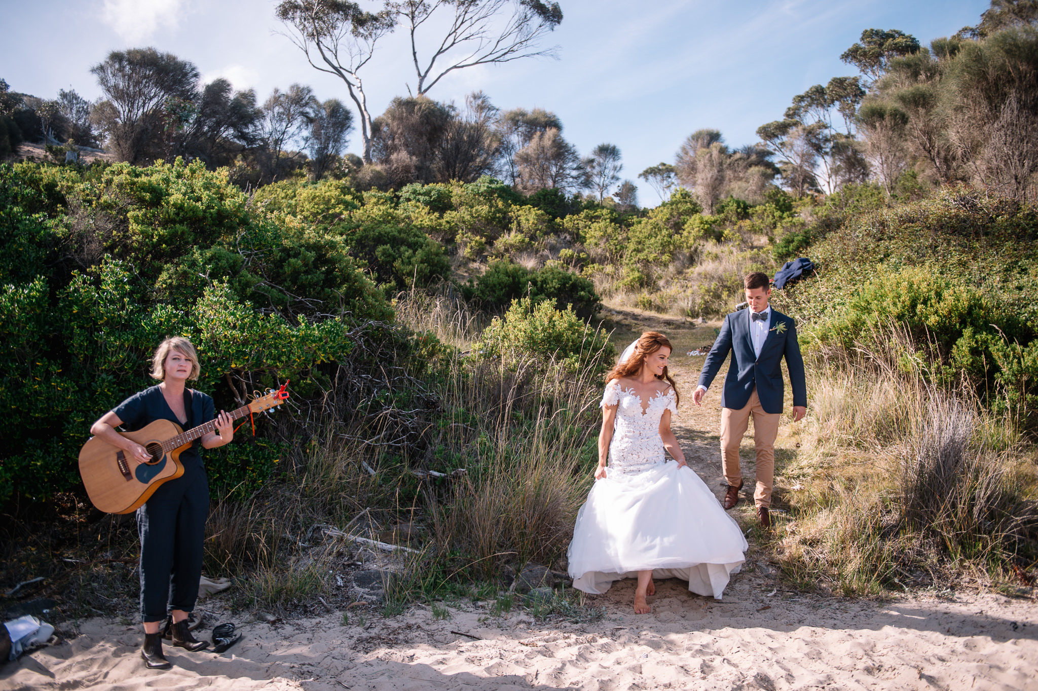  Bertie Blackman playing for the arrival of the happy couple on to the private beach 