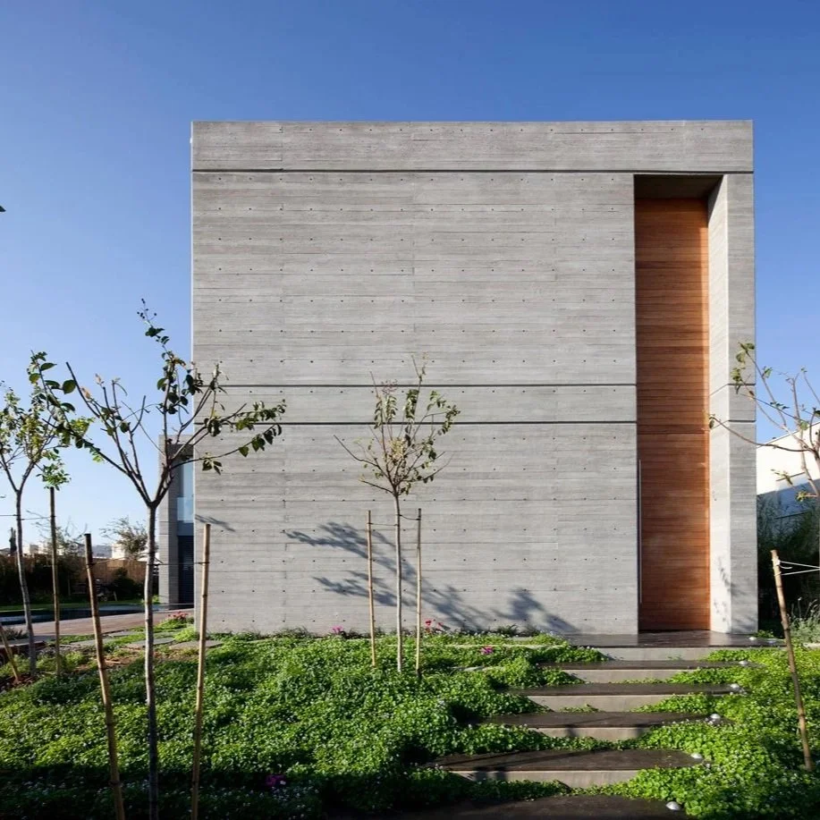 Xnet: Concrete Villa in Caesarea. An Anderman Architects residence defined by exposed concrete, precise geometry and a transparent link between two volumes.