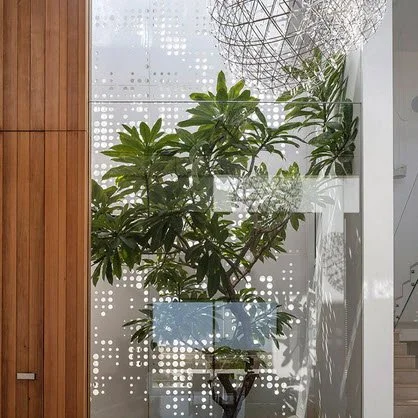 ArchiDiaries: Metal Lace House. An Anderman Architects residence wrapped in a delicate metal envelope that combines privacy, filtered light and a changing appearance.
