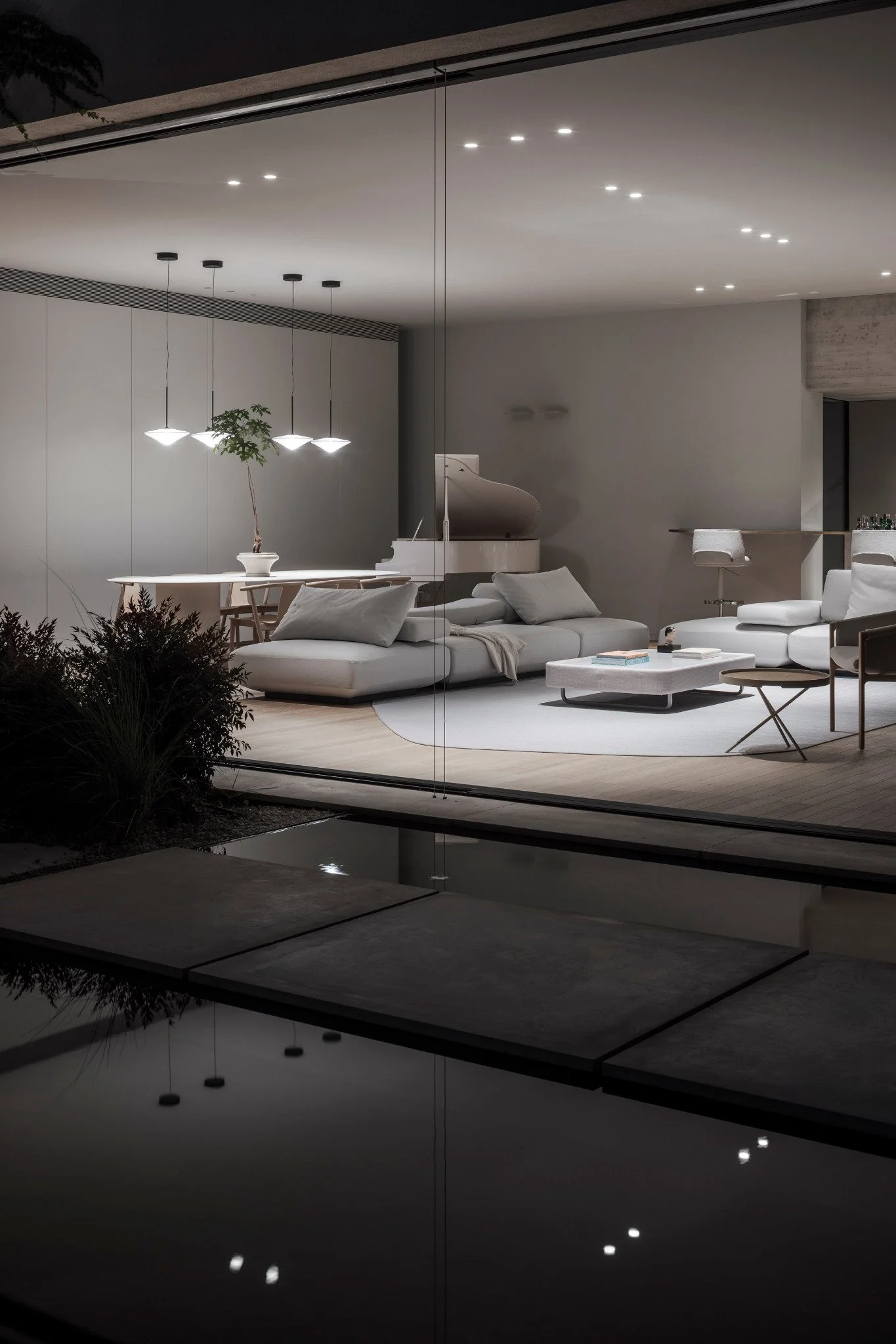 house-in-a-garden-anderman-architects-living-room-night-water-0082.jpg