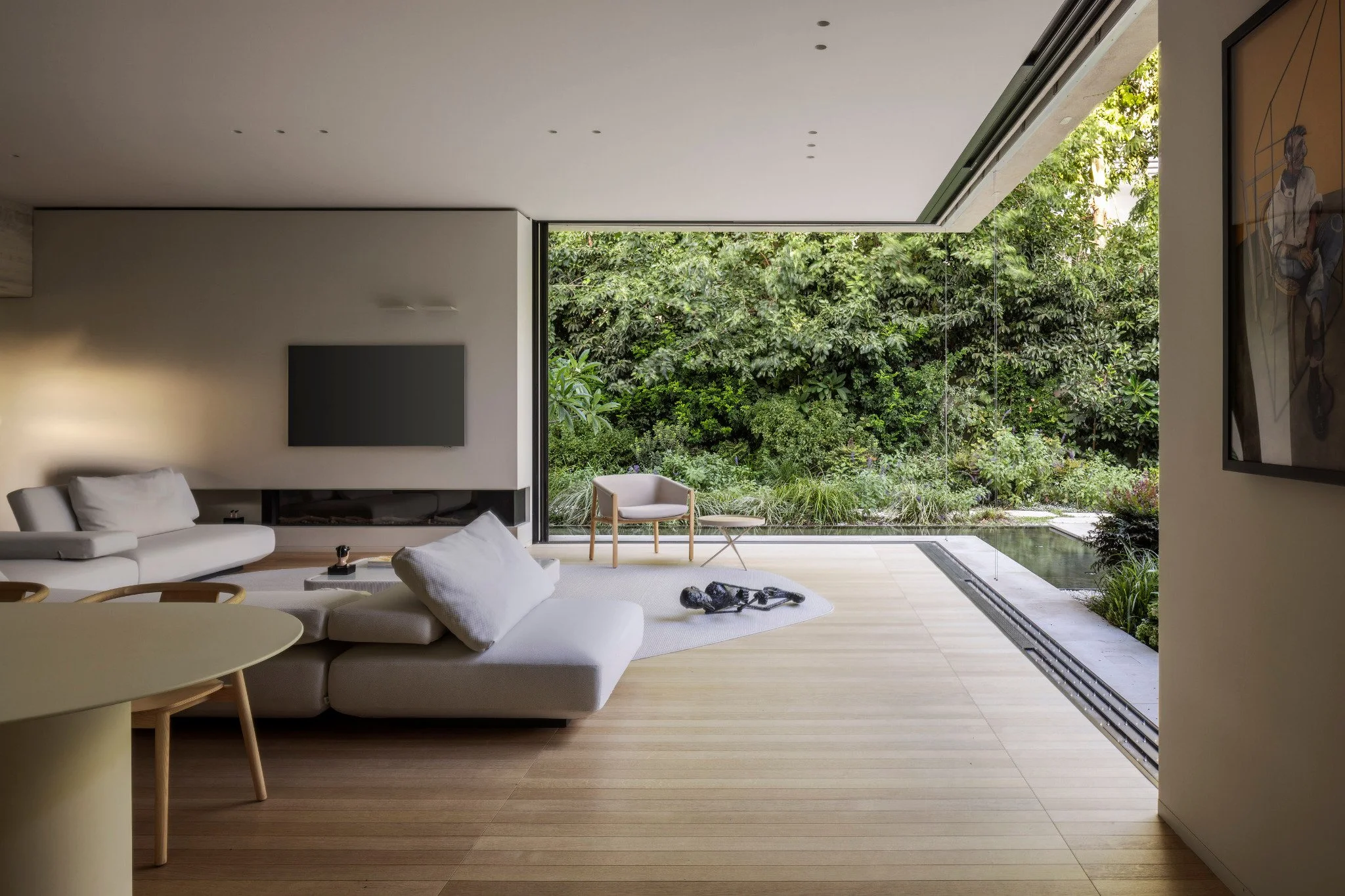house-in-a-garden-anderman-architects-living-room-pool-edge-0044.jpg