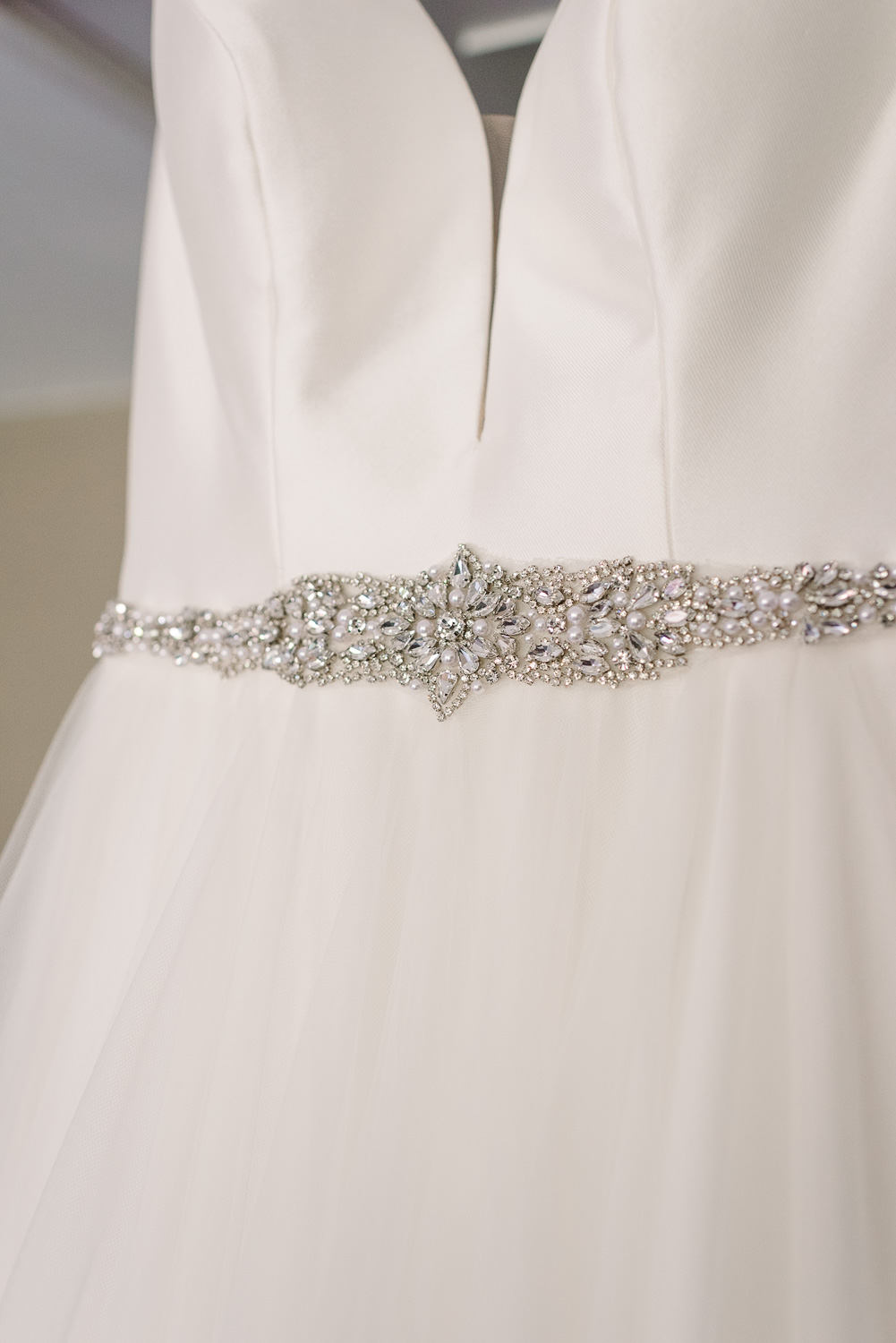 jewelled belt on bride's wedding dress