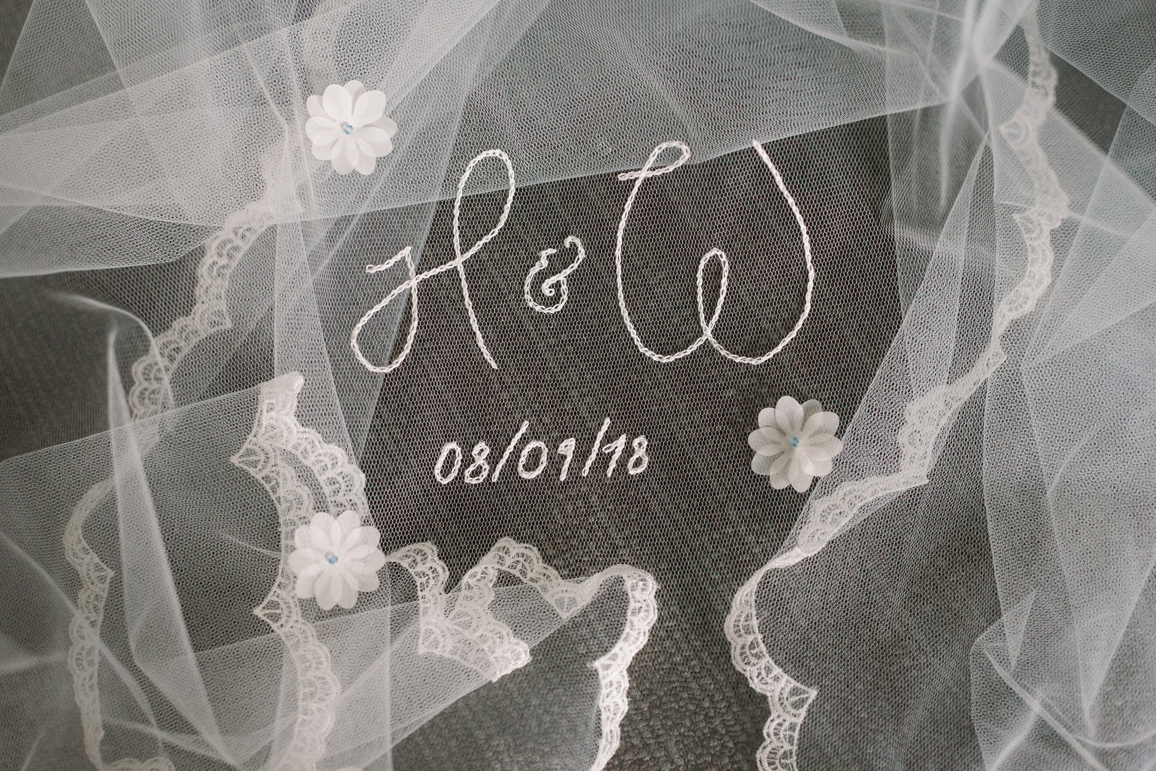 bride and groom's initials on wedding veil