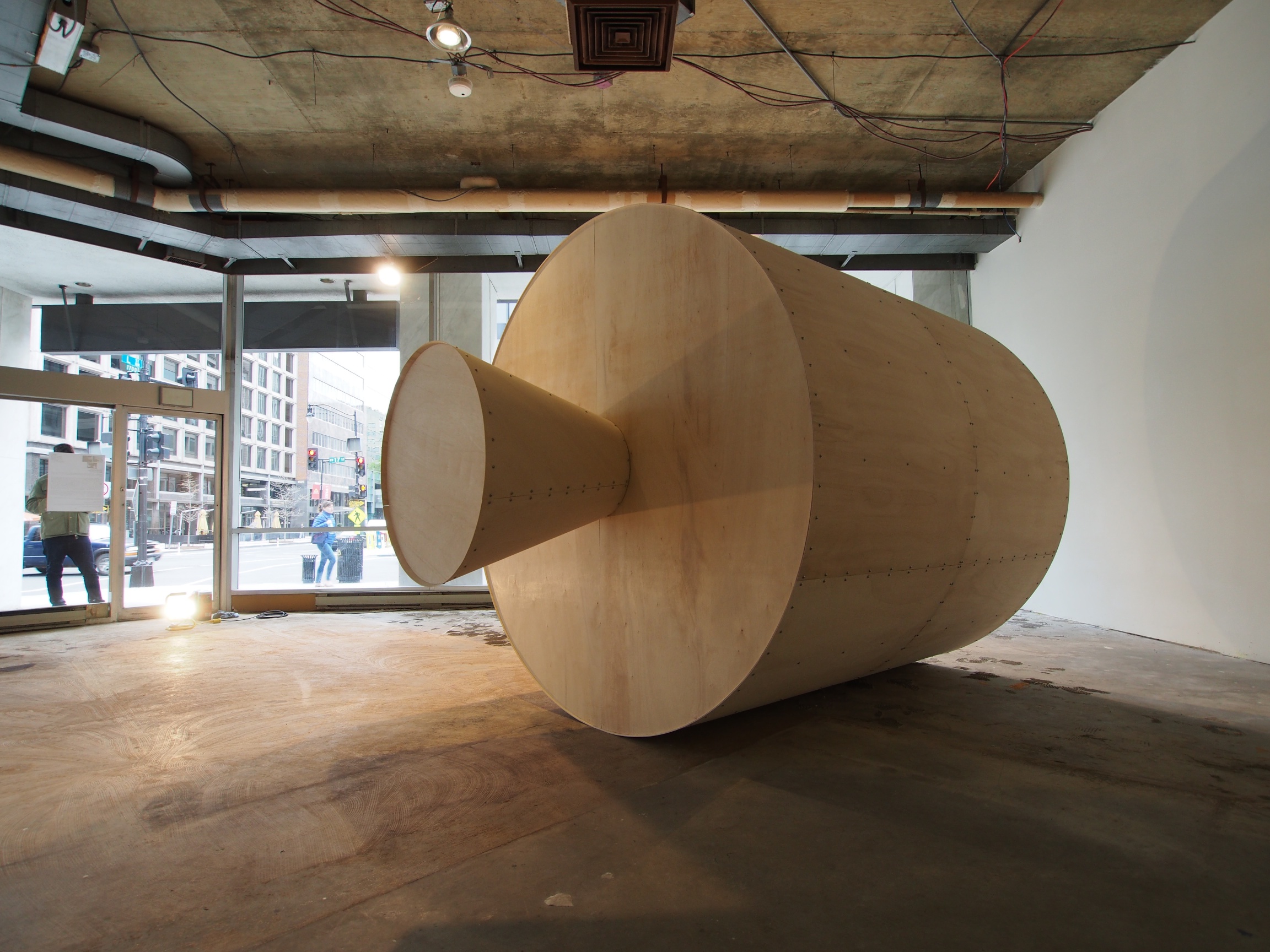 SATELLITE April - July 25 2015 1700 L St. NW Washington DC 8' h x 12' l x 8' w . plywood 3' x 3' blue square Inspired by and modeled after Early Bird, the first geosynchronous satellite launched into orbit in 1965. Sculpture was built in a vacant downtown storefront. Collaborative event programing ranged from weekly Lunch sessions, readings, performance, video events, and waffle breakfast. This project was supported in part by the Lenkin Company