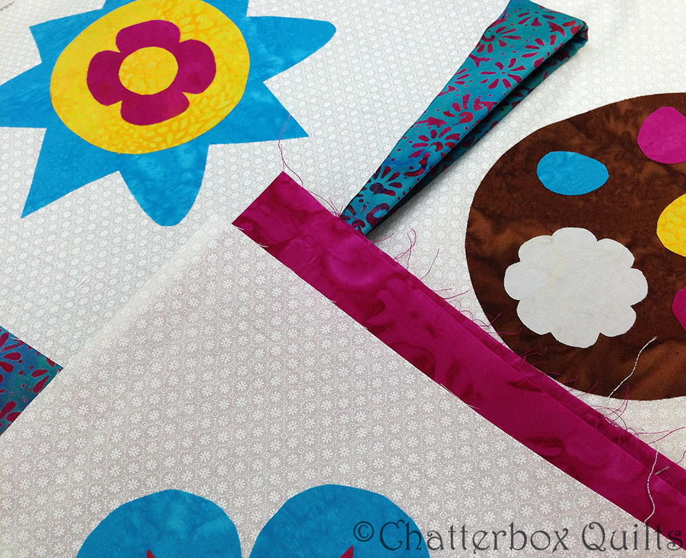A few Easter quilts waiting for quilting - still.