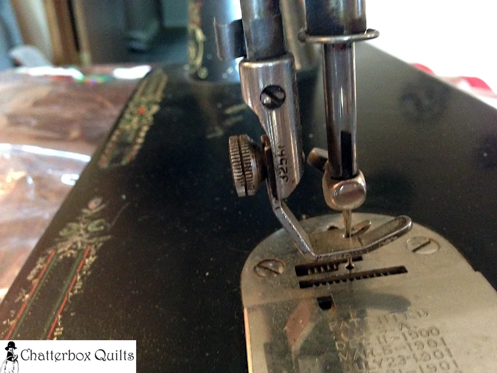 Back clamping attachments (feet) on this model of the Singer 66