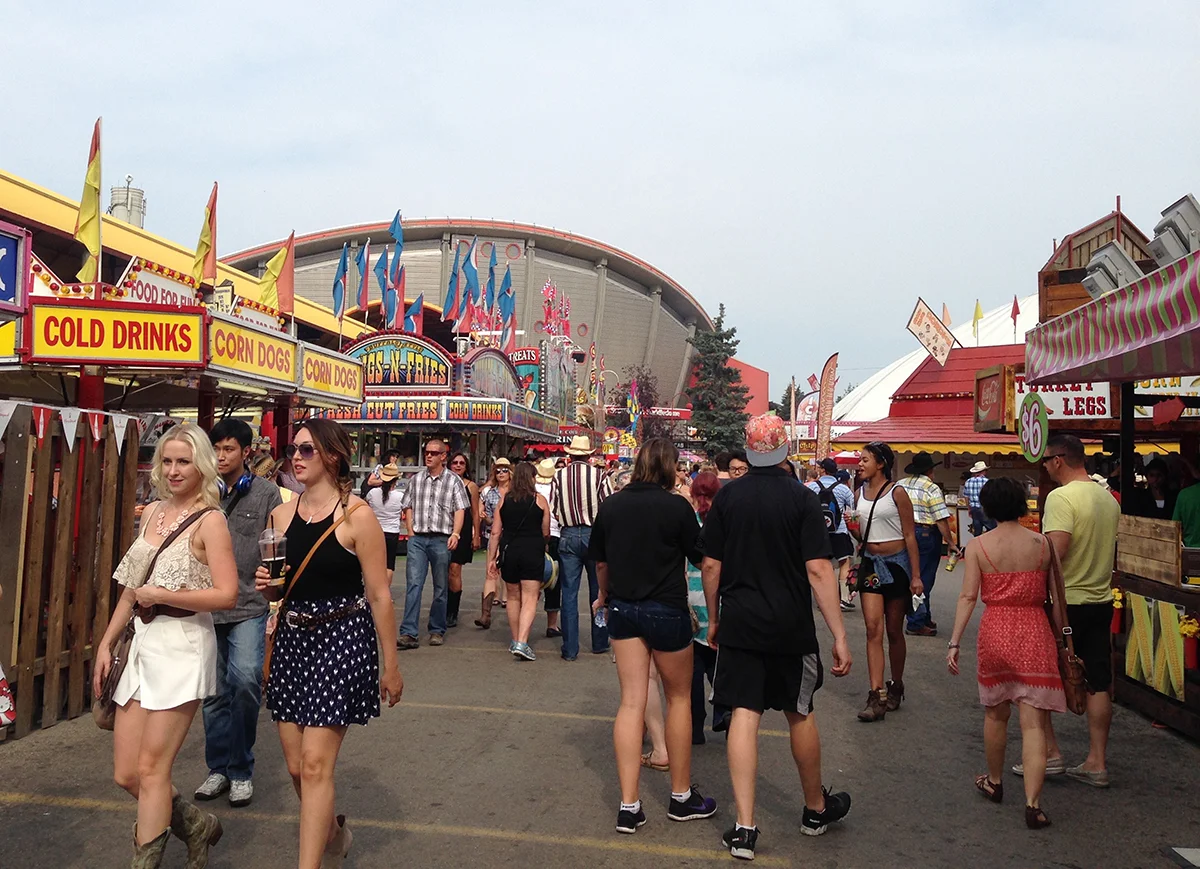 Strolling down the path between the food kiosks at the Calgary Exhibition and Stampede