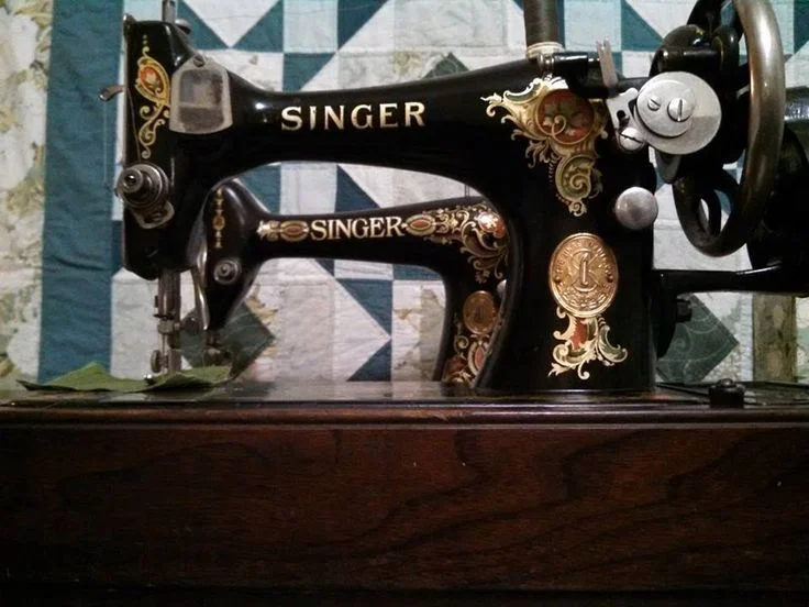 Can you tell the difference? The Singer 128 with the La Vencedora decals in in front of the Singer 66 Redeye model