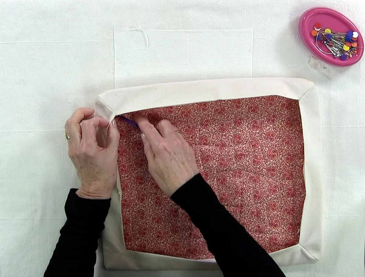 Push corners out gently with That Purple Thing or similar tool