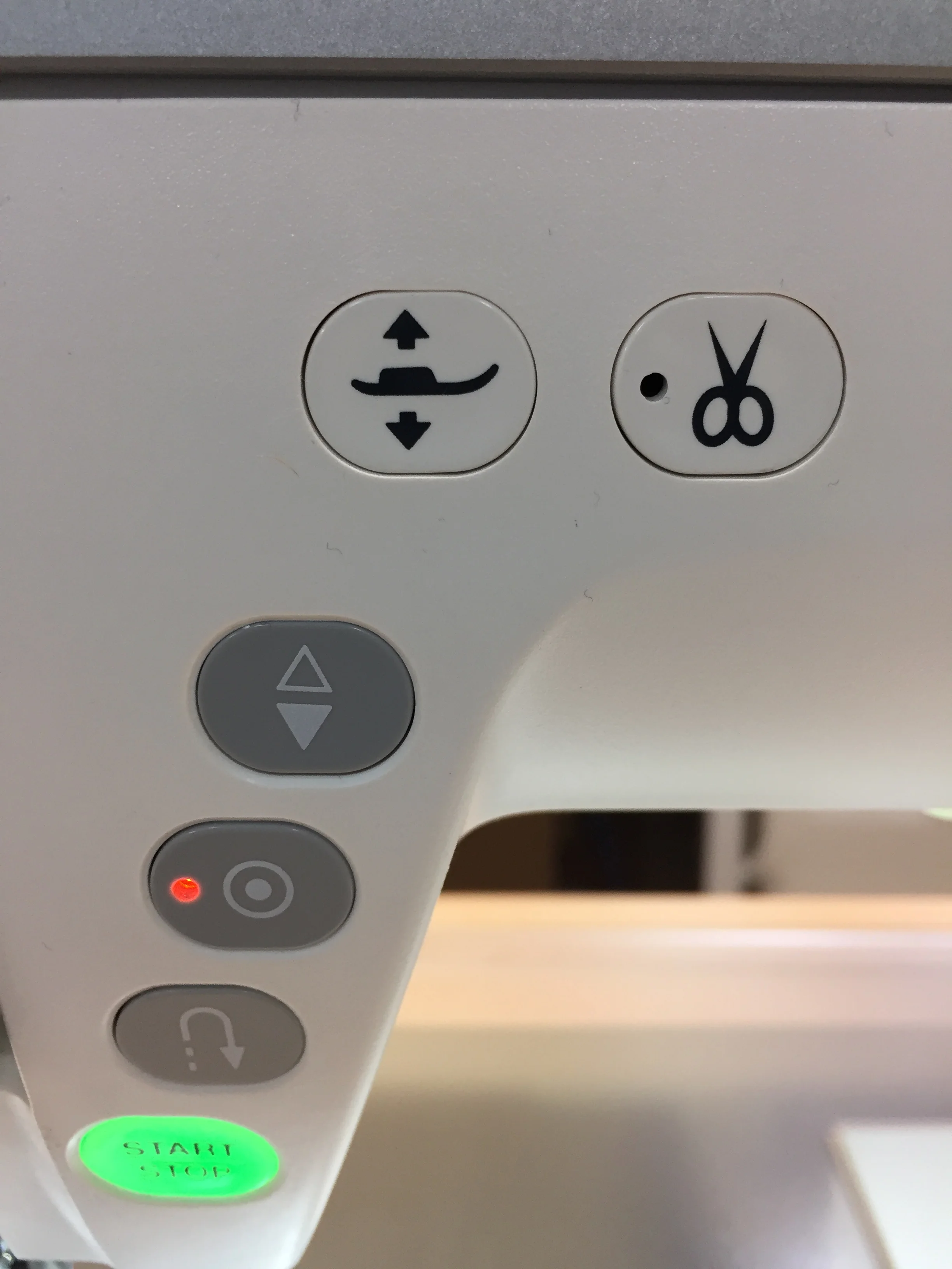 Click on the scissors icon and the thread cutter automatically snips your top and bottom threads.