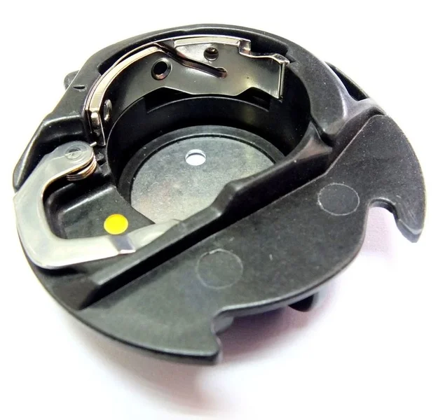 Janome yellow dot bobbin case.jpg