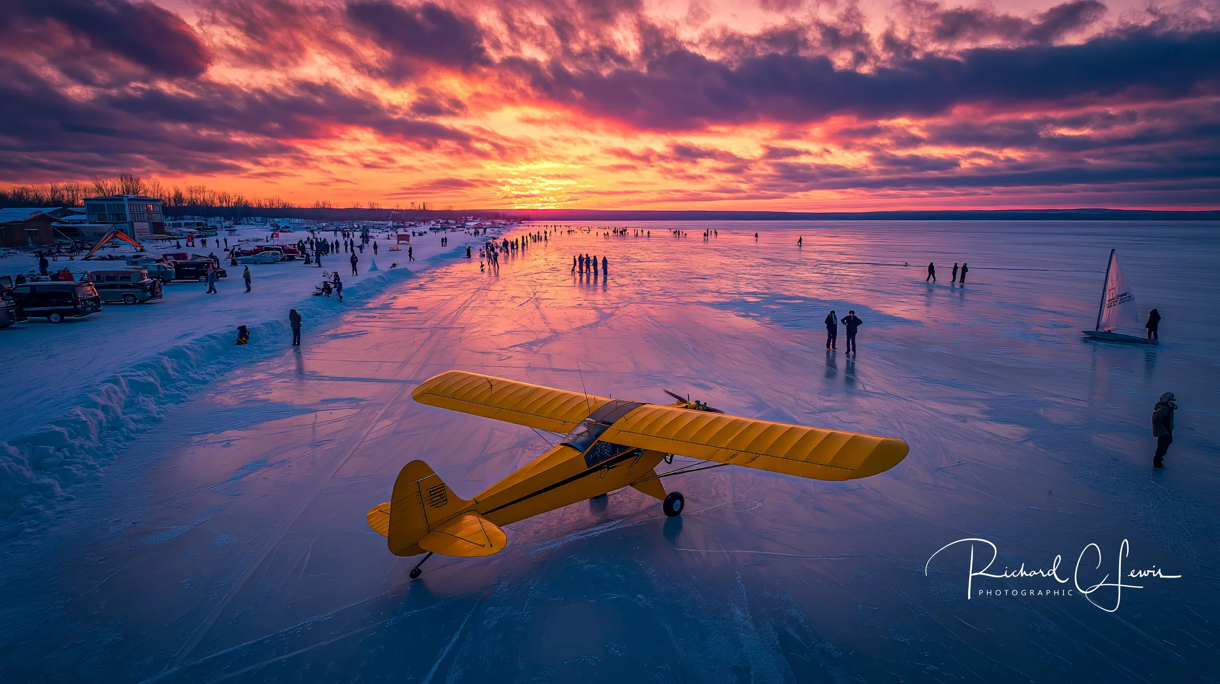 20260215-lewisr406_a_1945_Yellow_Piper_Cub_is_parked_on_the_frozen_lake__342097c5-7d57-49b4-be87-9942e0f5ebef-Edit.jpg (Copy)