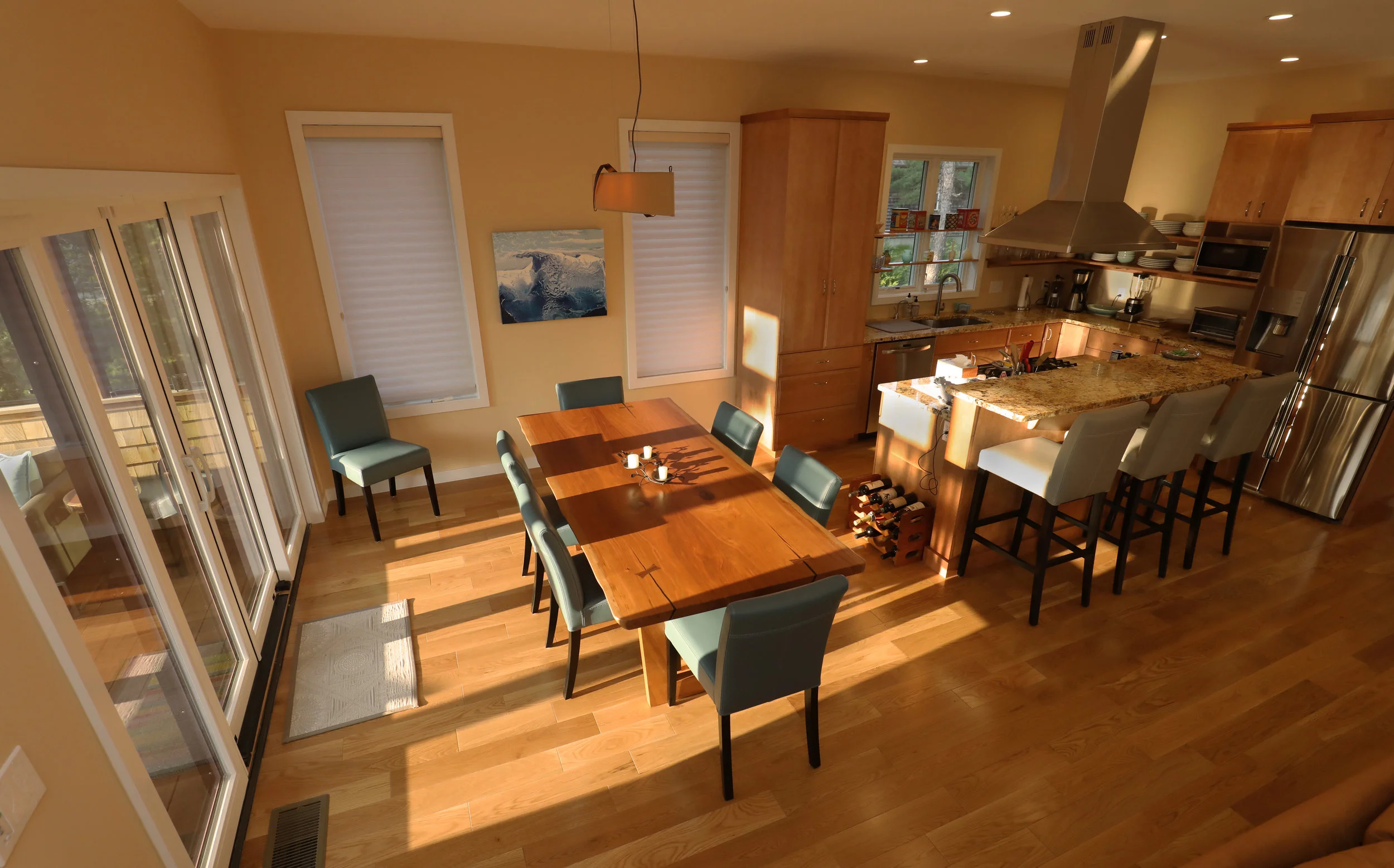The main level has an open floor plan to capture the cape light