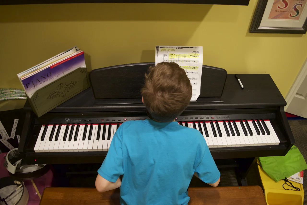 Adaptive Music Lessons: Developing New Skills and Targeting Learning Difficulties