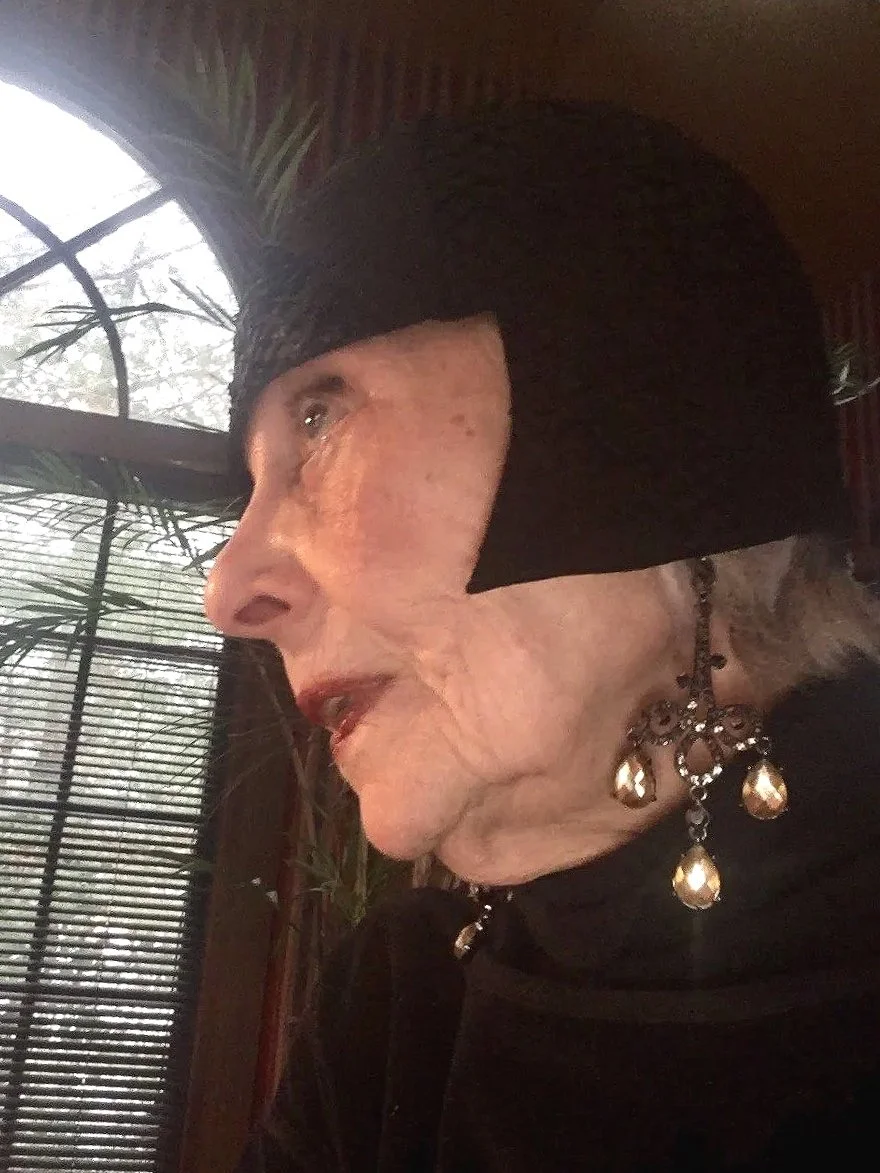 Helen wearing her Louise Brooks black Fishskin helmet