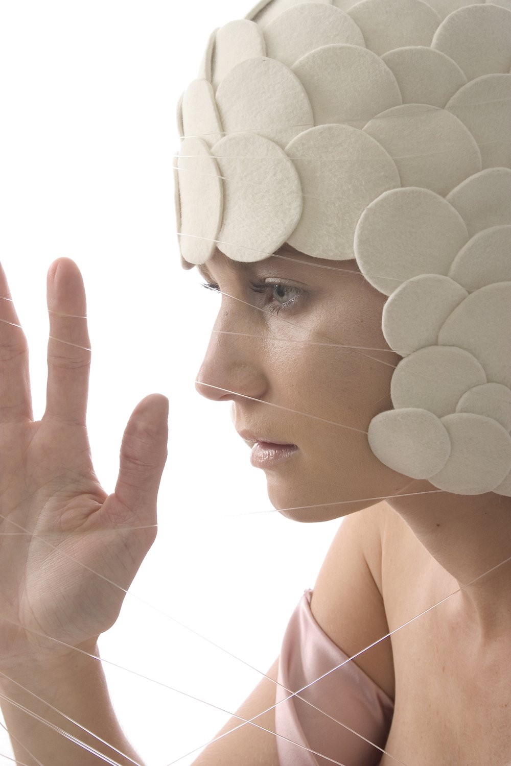Molecular Mermaid Helmet in Cream Fur Felt by Jasmin Zorlu, photo by Kirsten Brynne Costello, 2008