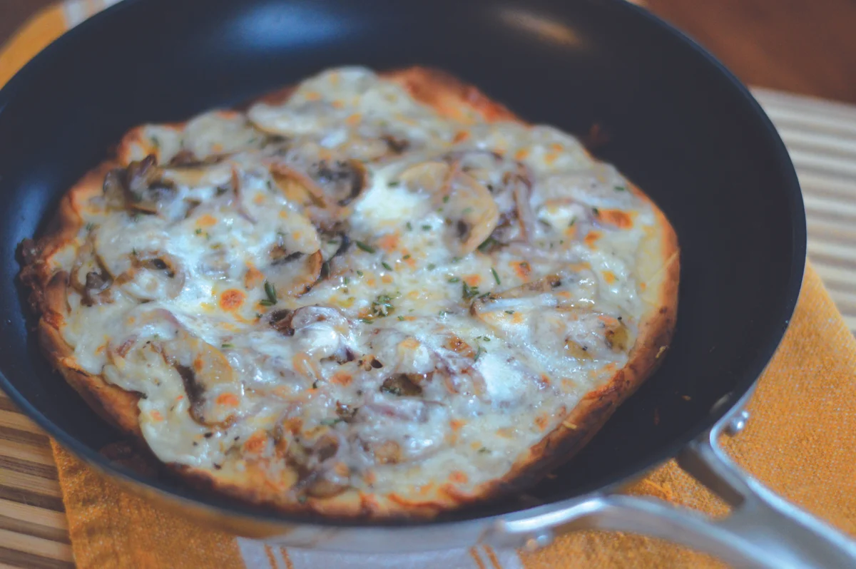 Mushroom & Onion Skillet Pizza with Roasted Garlic Sauce
