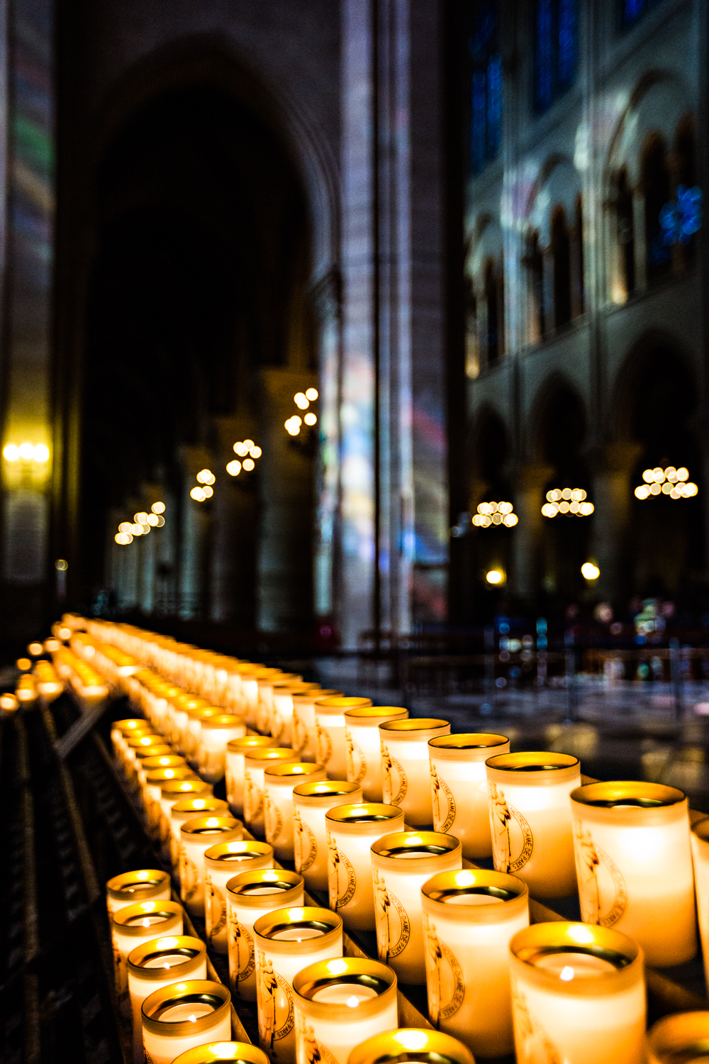 adventure-travel-photography-becky-brockie-paris-notre-dame-candles.jpg