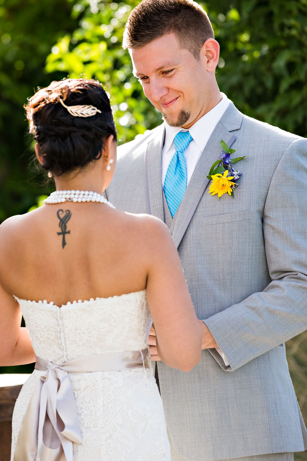 billings-montana-chanceys-wedding-ceremony-groom-smiles-at-bride.jpg
