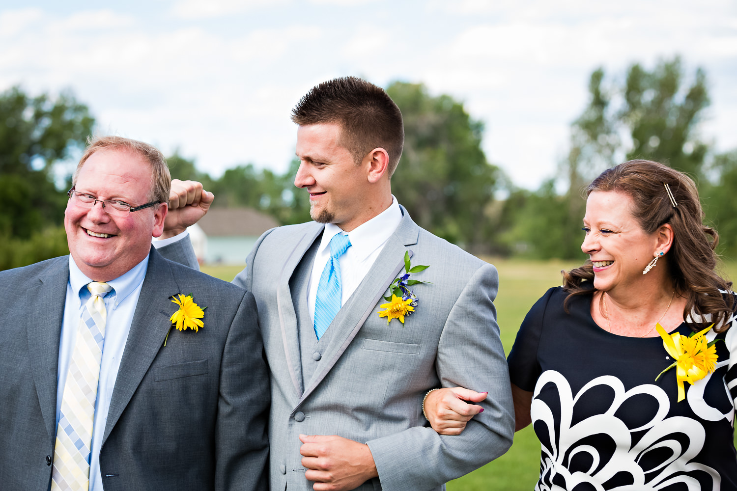 billings-montana-chanceys-wedding-ceremony-groom-parents.jpg
