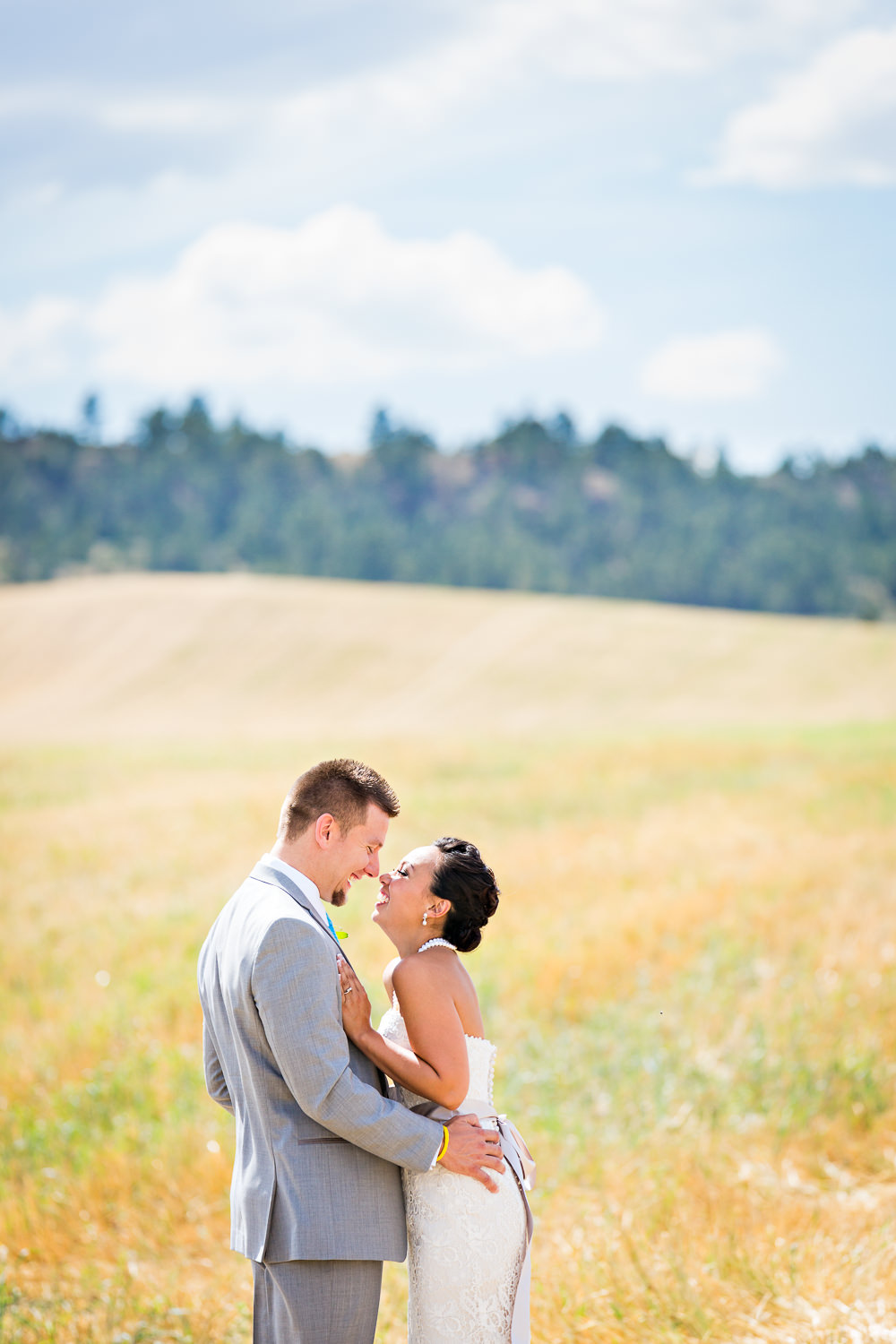 billings-montana-chanceys-wedding-first-look-bride-groom-hug.jpg