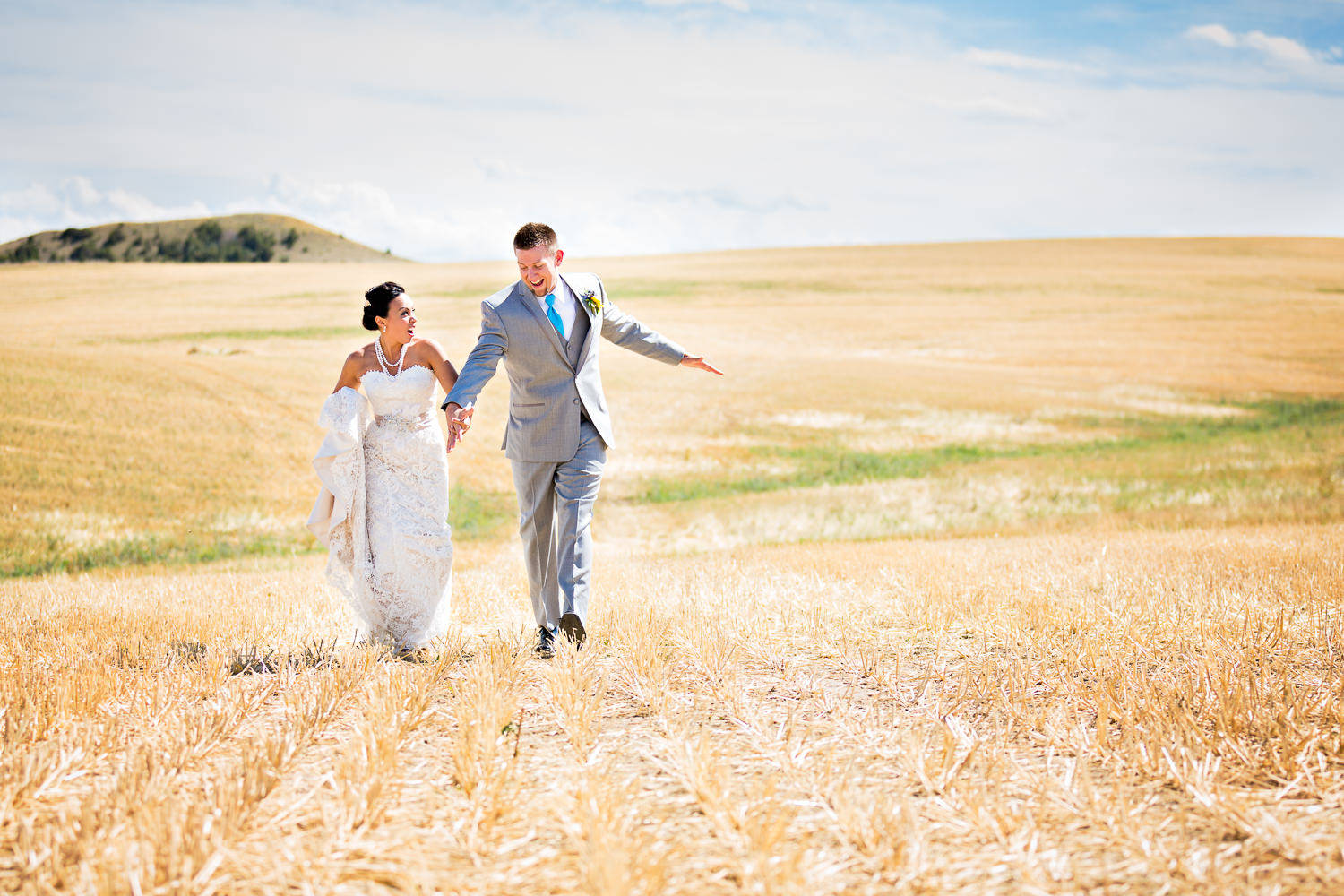 billings-montana-chanceys-wedding-first-look-bride-groom-running-away.jpg