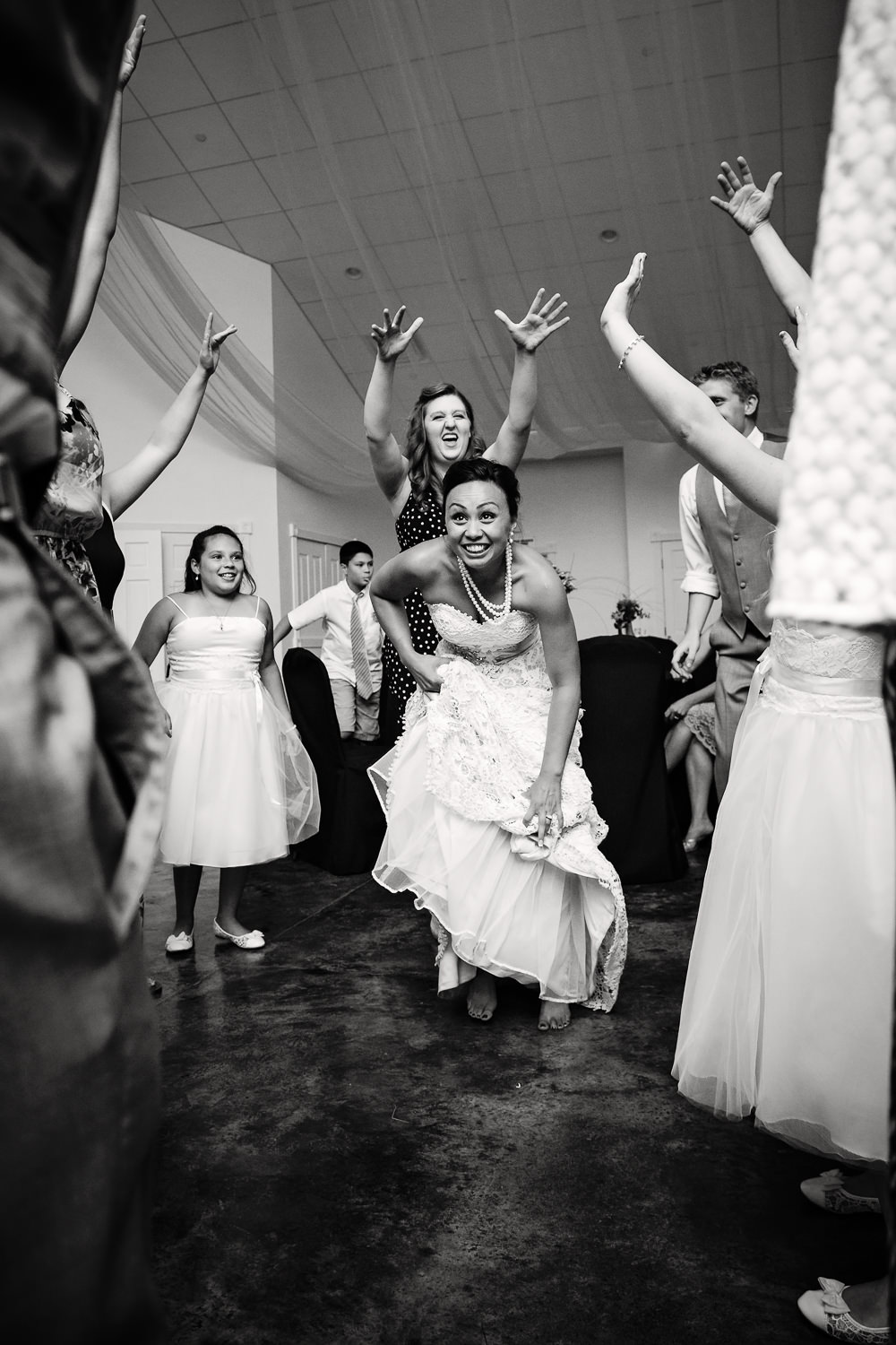 billings-montana-chanceys-wedding-reception-bride-dances-with-friends.jpg