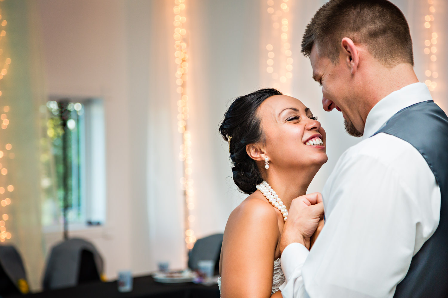 billings-montana-chanceys-wedding-reception-first-dance-bride-groom-smiling.jpg