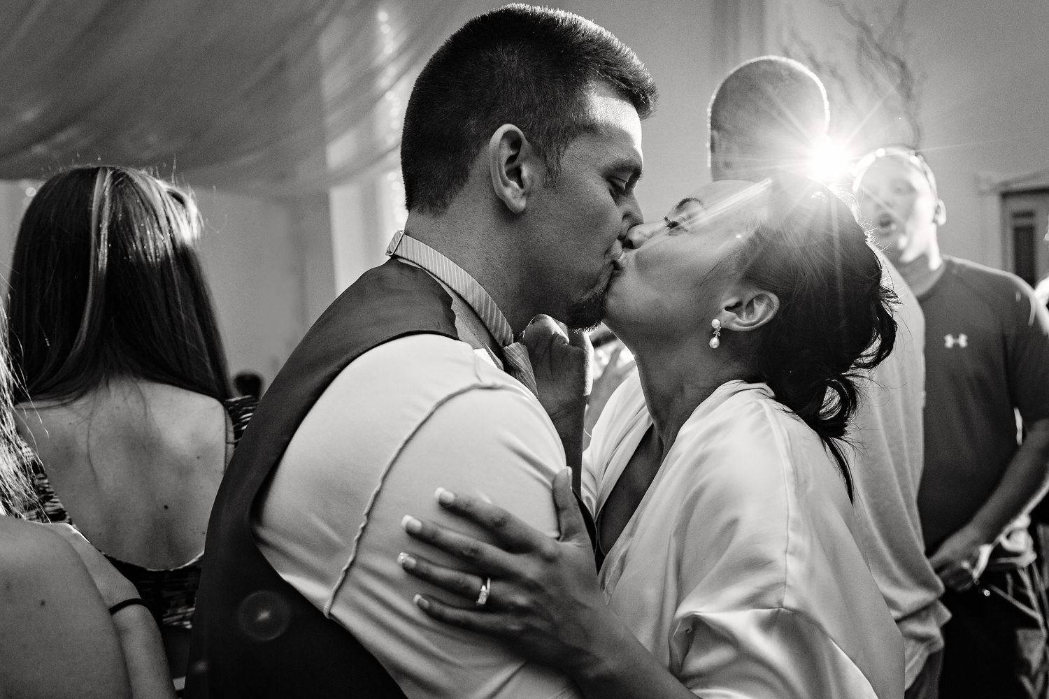 billings-montana-chanceys-wedding-reception-groom-bride-kiss.jpg