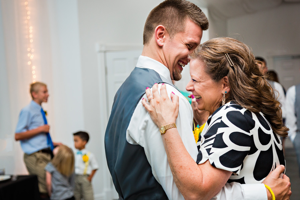 billings-montana-chanceys-wedding-reception-mother-son-dance-hug.jpg