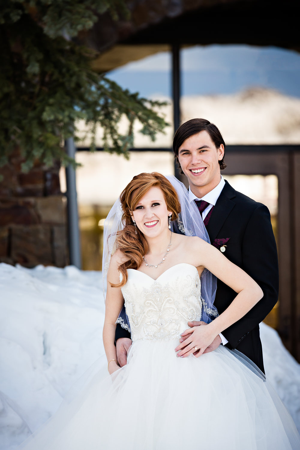 big-sky-montana-winter-wedding-breanna-first-look-bride-groom-traditional-pose.jpg