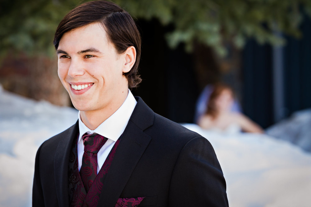 big-sky-montana-winter-wedding-breanna-first-look-groom-waits-for-bride.jpg