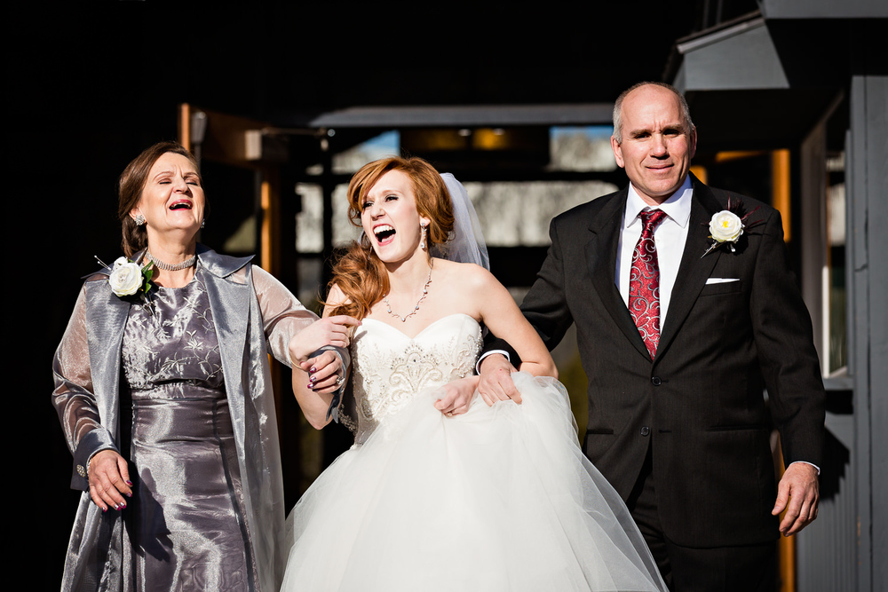 big-sky-montana-winter-wedding-breanna-ceremony-bride-laughing-with-parents.jpg