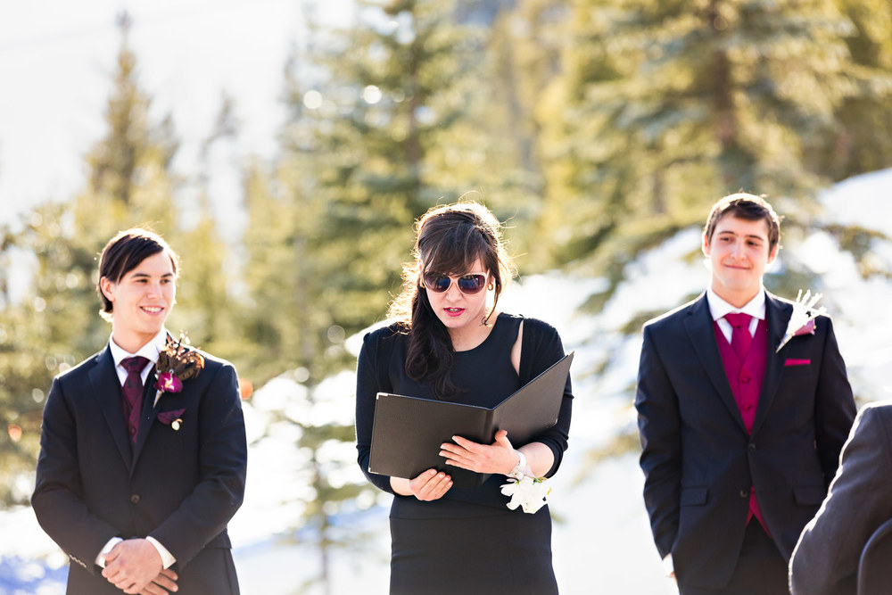 big-sky-montana-winter-wedding-breanna-ceremony-sister-reading.jpg