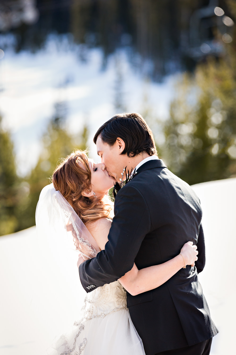 big-sky-montana-winter-wedding-breanna-ceremony-kiss.jpg