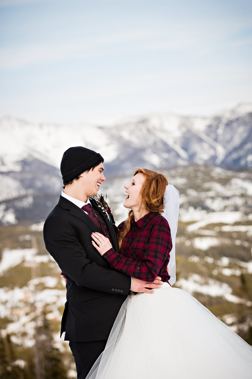 big-sky-montana-winter-wedding-breanna-formals-groom-bride-snowboarding.jpg