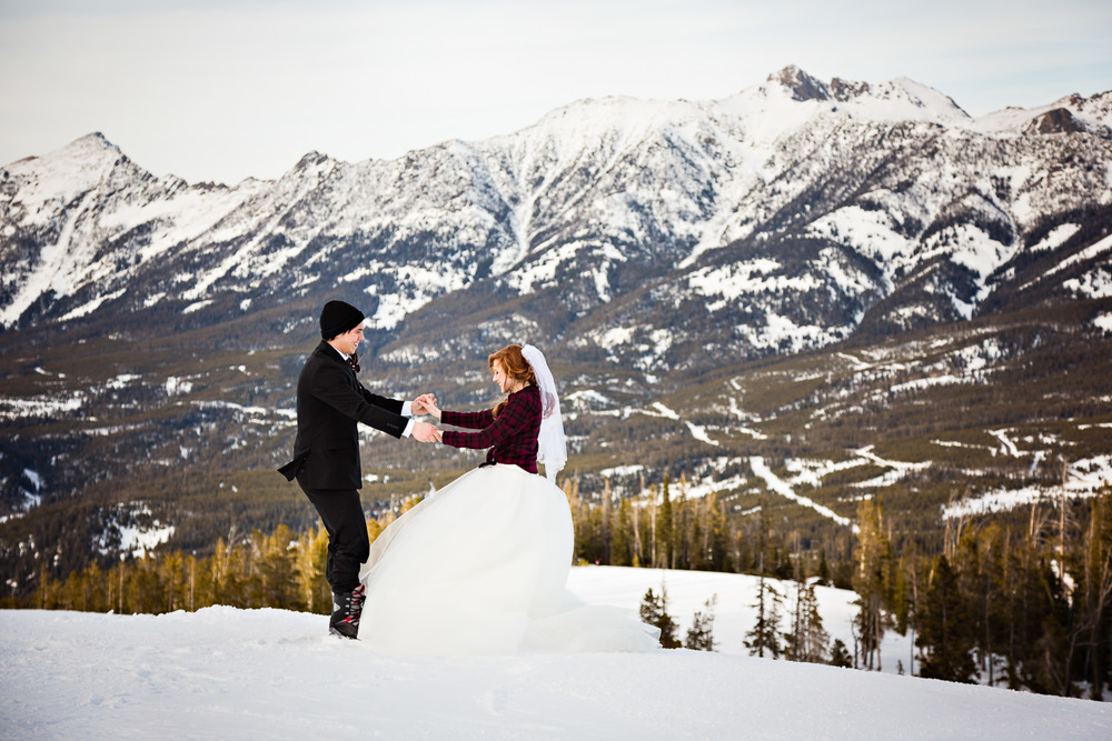 big-sky-montana-winter-wedding-breanna-formals-groom-dances-with-bride.jpg