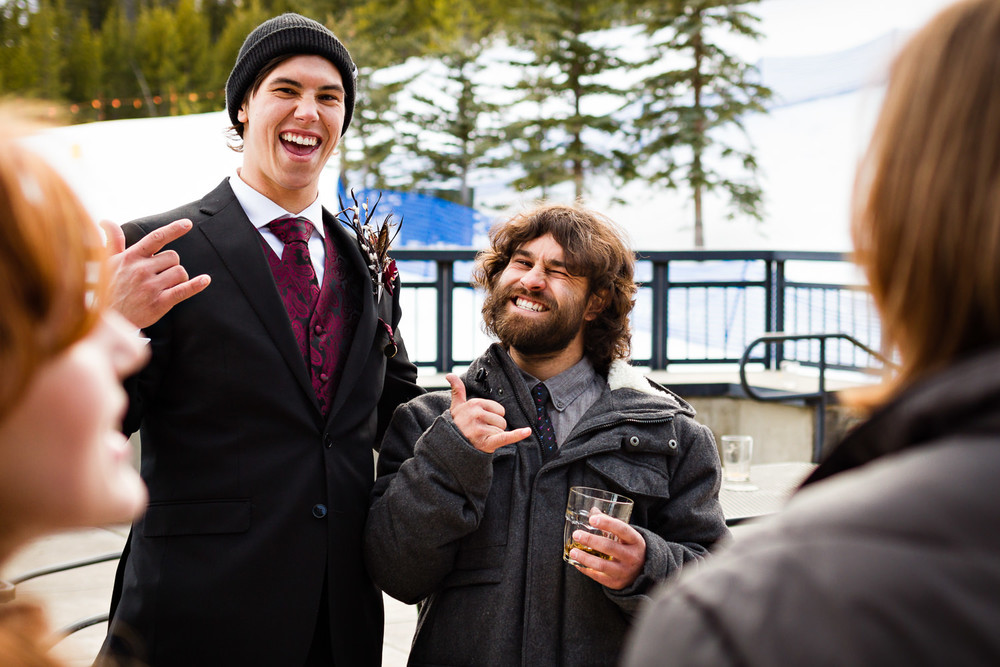 big-sky-montana-winter-wedding-breanna-reception-groom-friend-celebrate.jpg