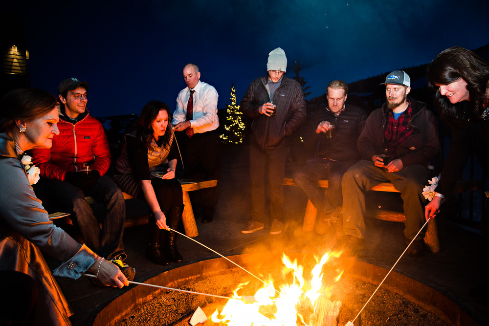 big-sky-montana-winter-wedding-breanna-reception-guests-roast-smores.jpg