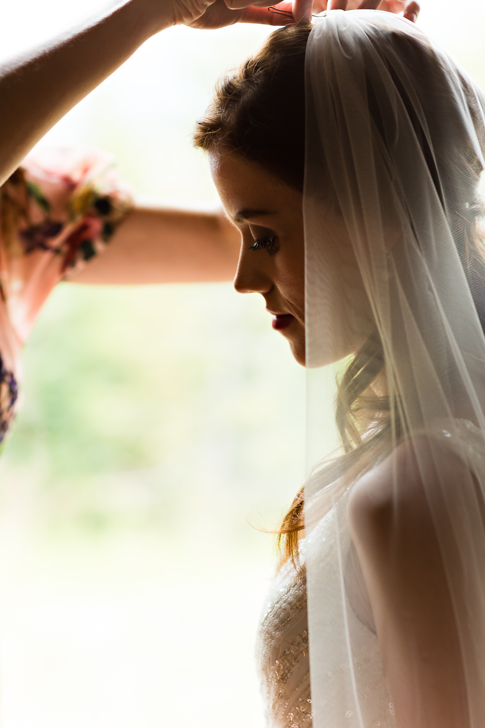 big-sky-wedding-becky-brockie-photography-bride-secure-veil-nataliia.jpg