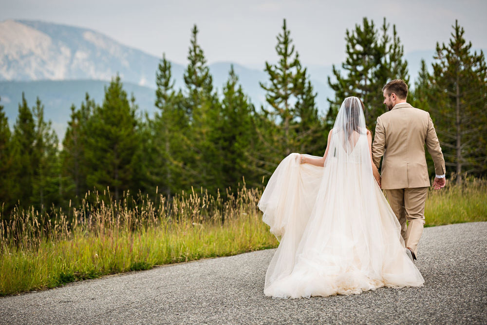 big-sky-wedding-becky-brockie-photography-couple-walk-mountains.jpg