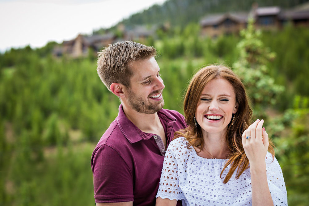 big-sky-montana-engagement-moonlight-mountains-couple-laughing.jpg