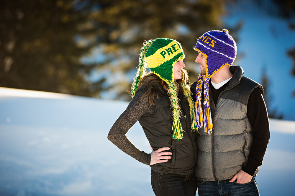 big-sky-montana-winter-engagement-session-couple-looking-at-one-another.jpg