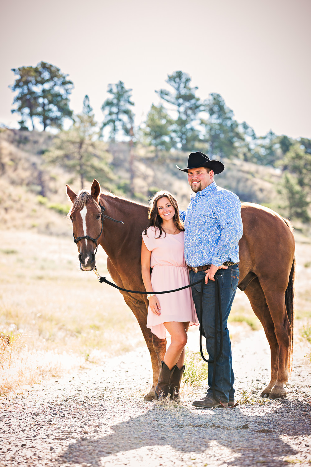 billings-montana-engagement-session-couple-pose-with-horse.jpg